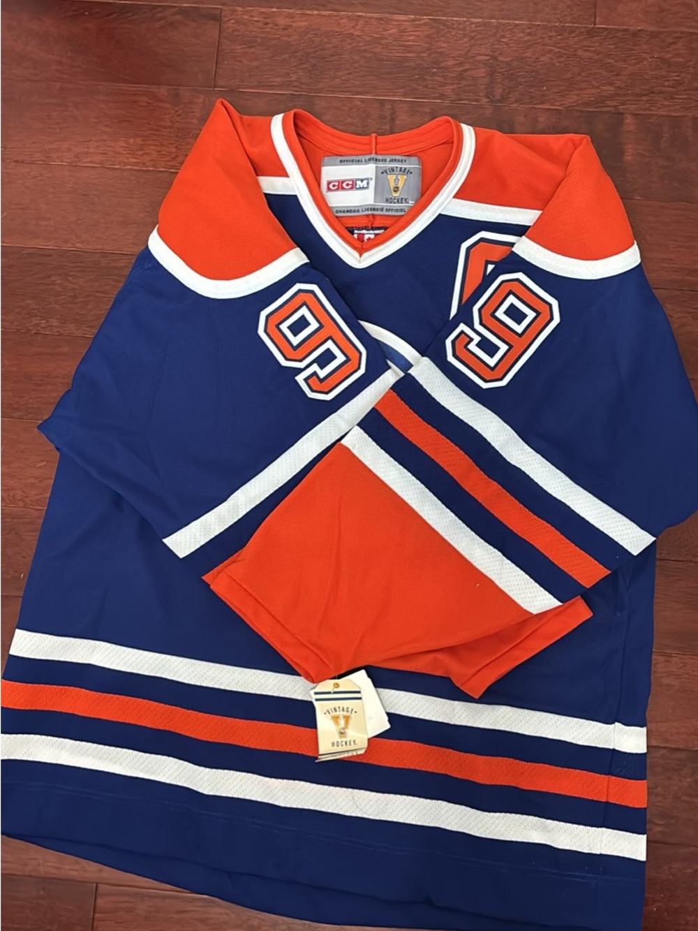 CCM Blue and Orange Edmonton Oilers Captain Hockey Jersey - Picture 2 of 5